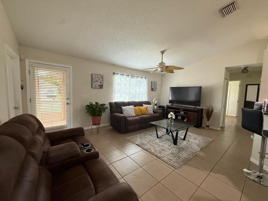Photo of 218 SW Amesbury Avenue, Port Saint Lucie, FL 34953 (MLS # R11156584)