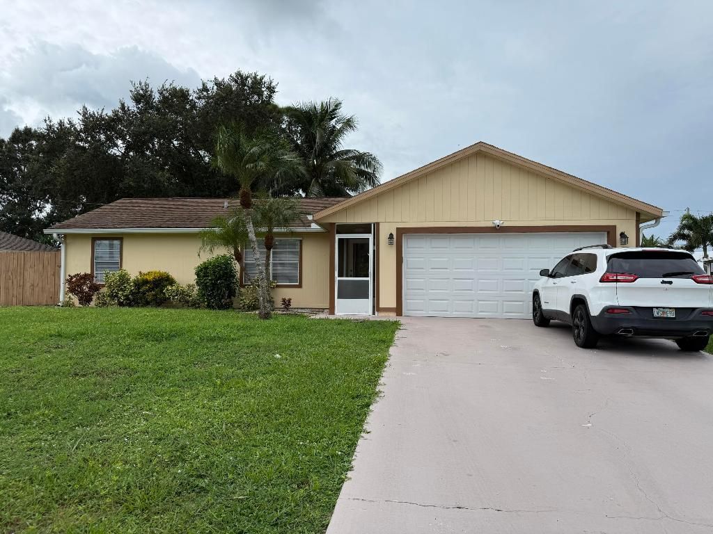 Photo of 218 SW Amesbury Avenue, Port Saint Lucie, FL 34953 (MLS # R11156584)