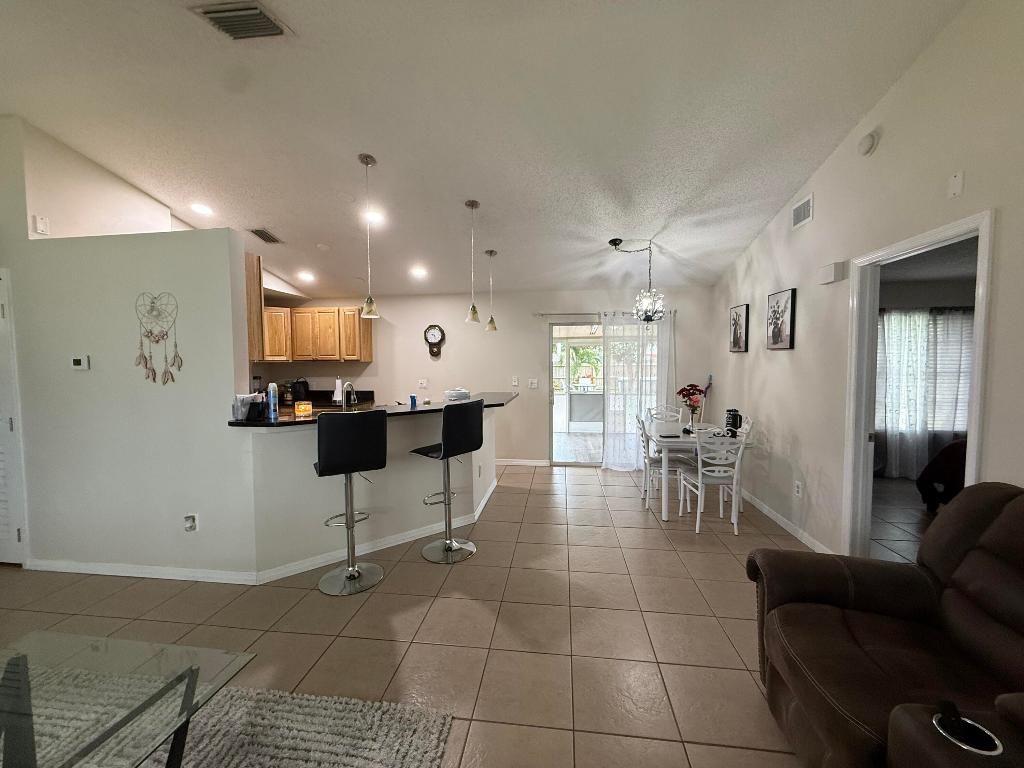 Photo of 218 SW Amesbury Avenue, Port Saint Lucie, FL 34953 (MLS # R11156584)