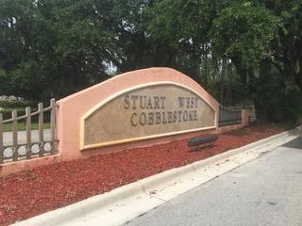 Photo of 10448 SW Fiddlers Way, Palm City, FL 34990 (MLS # R10683166)