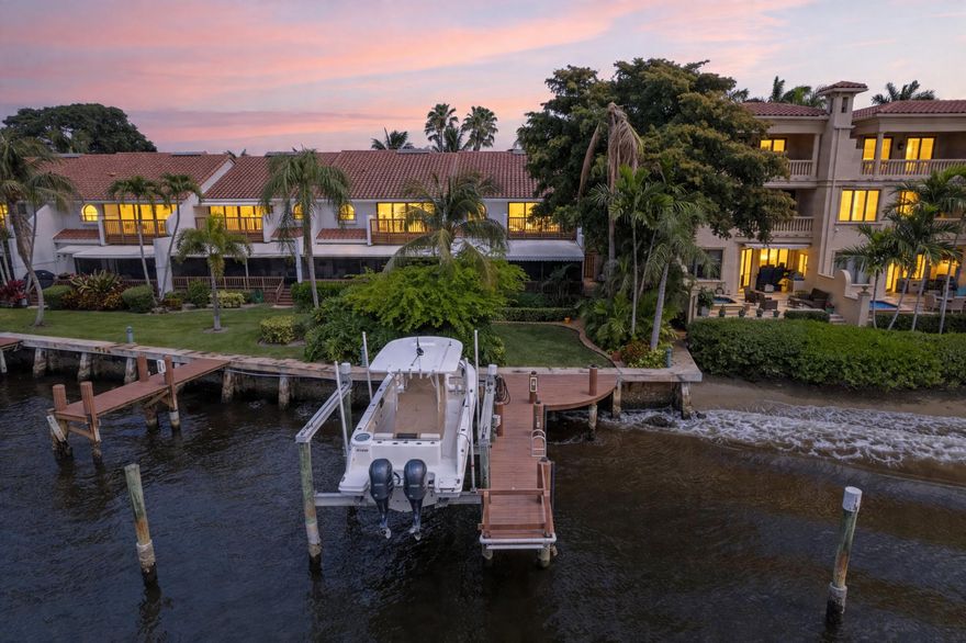 ABSOLUTELY GORGEOUS WATERFRONT 2-STORY TOWNHOUSE | PRESTIGIOUS OCEAN RIDGE YACHT CLUB |  BREATHTAKING PANORAMIC INTRACOASTAL VIEWS | DEEDED PRIVATE DOCK | 2 BOAT SLIPS | NEW 24K LIFT | OCEAN ACCESS | NO FIXED BRIDGES | END UNIT | FULLY RENOVATED | EXQUISITE HIGH-END QUALITY MATERIALS & WORKMENSHIP | Bright Open Floor Plan | LED Custom & Recessed Lighting | Eat-In Kitchen | Large Center Island/Bar | Quartz Counters | White Wood Cabinets | S/S Appliances | Formal Dining Room | Wine Fridge | Large Primary Suite | Custom Walk-In Closet | Ensuite, Dual Sinks, Soaking Tub & Glass Shower | Private Balcony | Screened Deck | Outdoor Shower | Immaculate Manicured Lush Landscaping | Courtyard Entrance | 1 Car GA | Paver Driveway | Pool & Clubhouse | Prime Ocean Ridge Location |2024 AC |Impact Windows