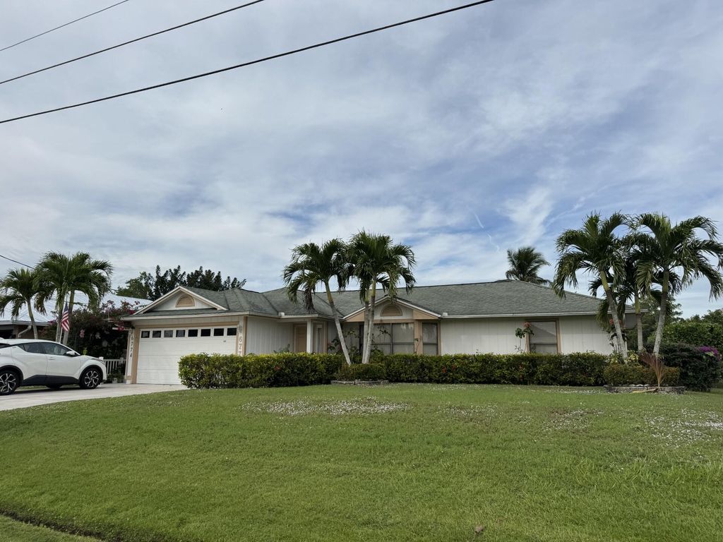 Photo of 6774 NW Abigail Avenue, Port Saint Lucie, FL 34983 (MLS # R11162233)