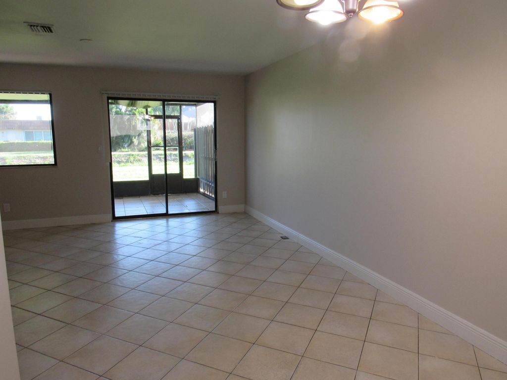 Photo of 5706 Channel Drive, Greenacres, FL 33463 (MLS # R11037164)