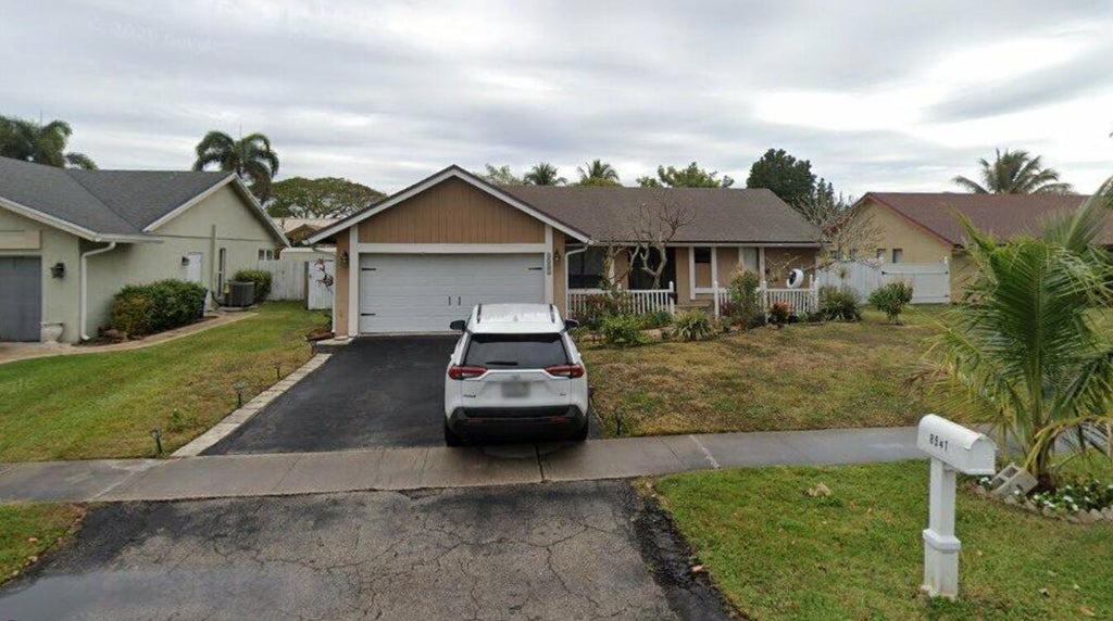 Photo of 8541 NW 51ST Court, Lauderhill, FL 33351 (MLS # B26067447)