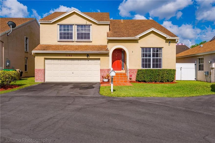 Magnificent 4br/2.5ba/2cg home in desirable Scarborough community in the heart of Davie.  Top rated A+ school district at all grade levels.  Beautiful, polished travertine marble floors on the first floor & wood laminate on second.  Newly remodeled kitchen, granite countertops & upgraded appliances.  Volume ceiling in the living room, spacious family room & formal dining room.  Eat-in kitchen/snack counter/breakfast area, home office with custom built-in cabinets & desk, crown molding & extended screened patio.  Owner's bath has large spa like shower & walk-in closets.  New AC unit, new ceiling fans, new toilets & fresh paint.  Home warranty. Unique extra parking space perfect for your boat, jet ski or additional vehicle.  This home is absolutely move-in ready!  Your Buyer will love it!