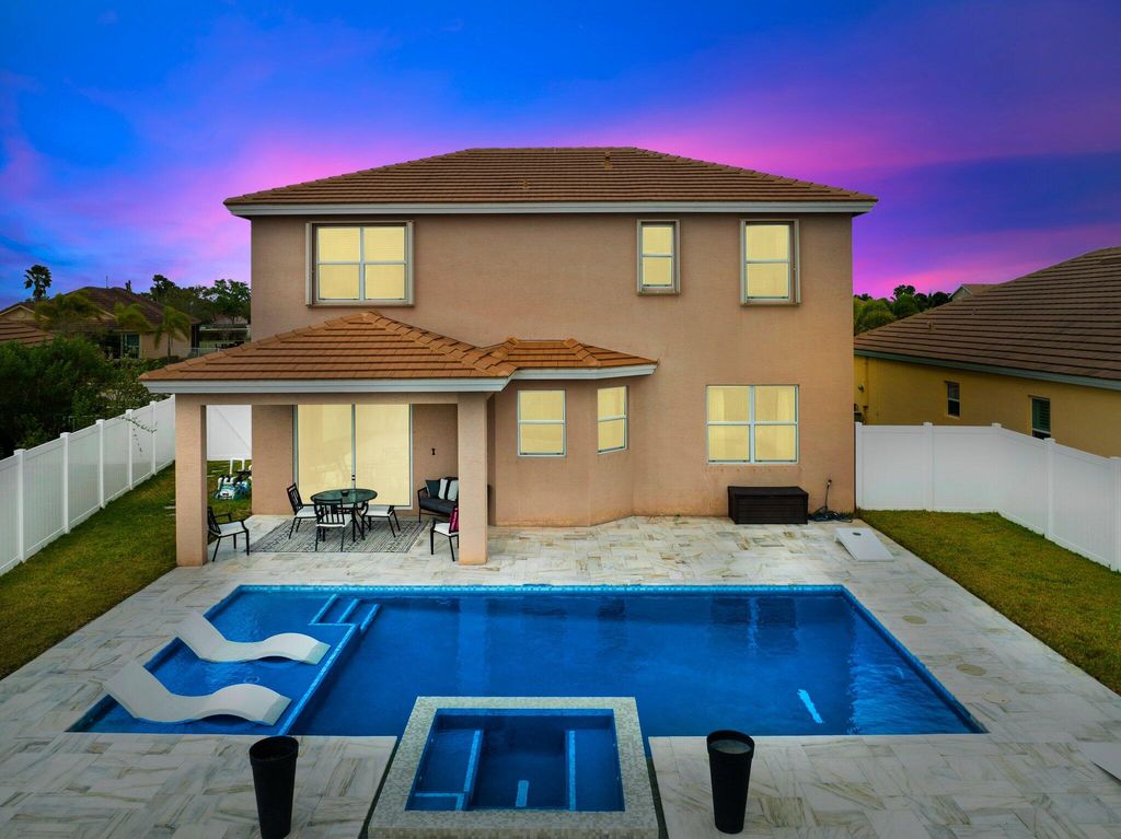 Photo of 11561 SW Rowena Street, Port Saint Lucie, FL 34987 (MLS # R10967888)