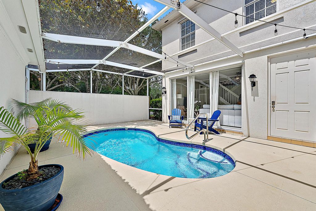 Photo of 107 Rivinia Drive, Jupiter, FL 33458 (MLS # R11084915)