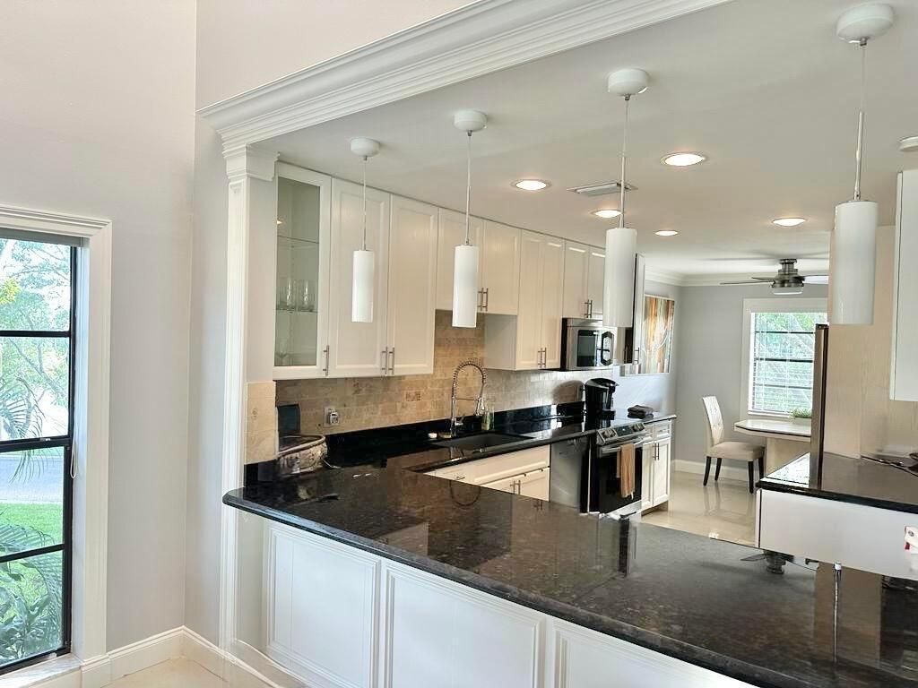 Photo of 59 Eastgate Drive #D, Boynton Beach, FL 33436 (MLS # R11111715)