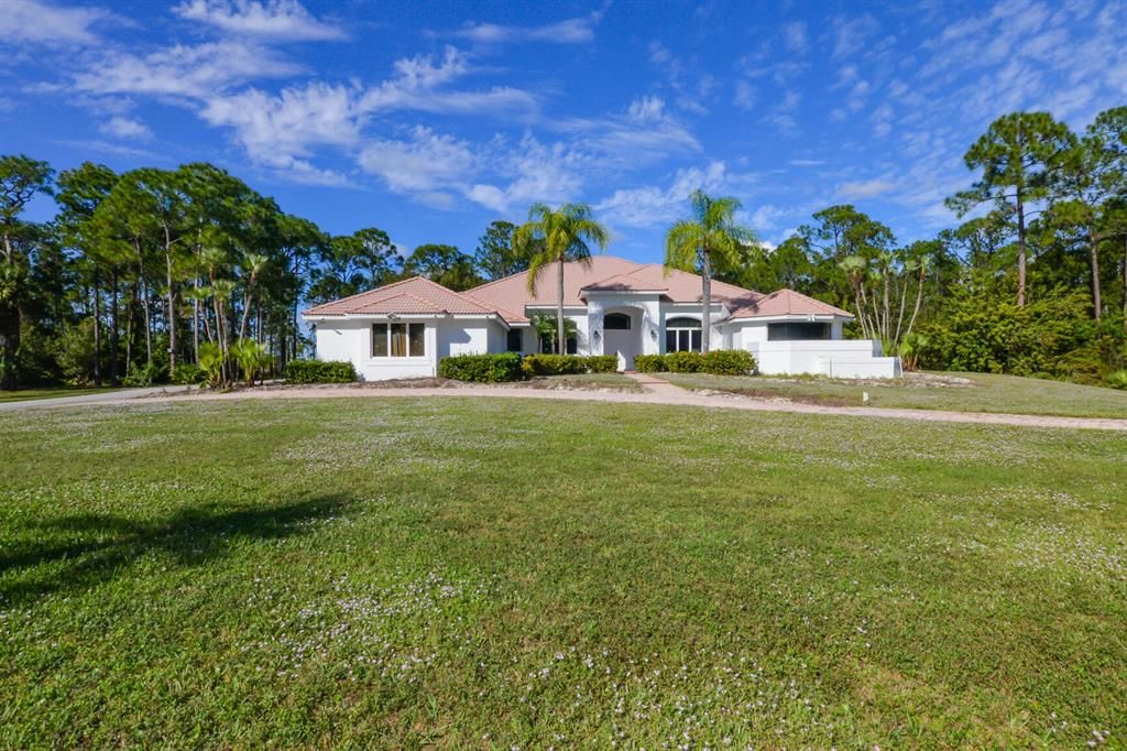 Photo of 7866 Saddlebrook Drive Dr, Port Saint Lucie, FL 34986 (MLS # R10766331)