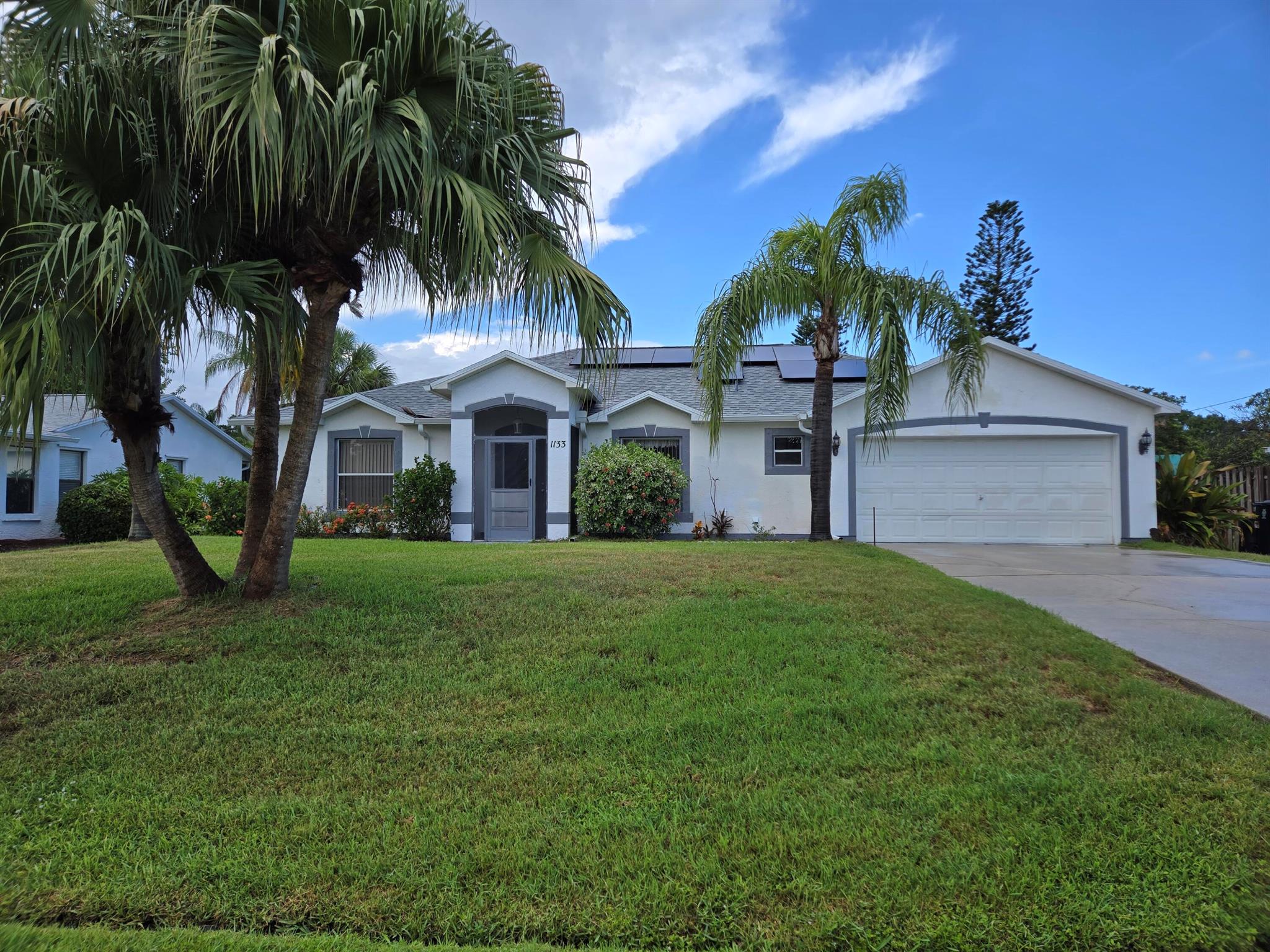 Come view this CBS Pool Home in SANDPIPER Community one of Port Saint Lucie's most desirable neighborhoods. Over 2000sqft This home has 3 Bedrooms with an office which could be converted to a forth bedroom. Home has a great open plan with Vaulted Ceilings Bright and airy Great room with large windows and French doors open to covered patio and screened pool area. The kitchen has a large island open to the the Great room Split Plan 2 Bedrooms and a bath on one side. Large Master Bedroom has a Walk in Closet and an ensuite with soaking tub/ separate walk in shower and make-up station. there is a Formal Dinning perfect for entertaining. There is A Separate Laundry/Storage room. Owner Replaced new Roof 2022, AC 2024, Water Heater, Solar Panels installed 2022. Sandpiper is Centrally Located
