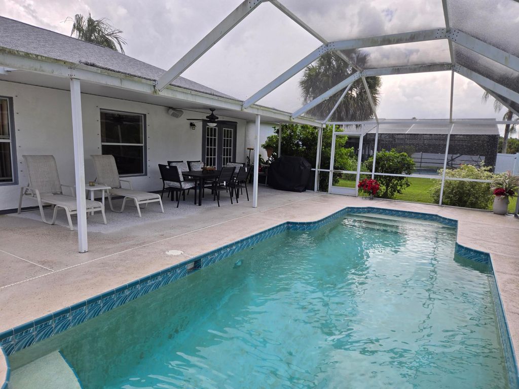 Photo of 1133 SE Palm Beach Road, Port Saint Lucie, FL 34952 (MLS # R11101943)