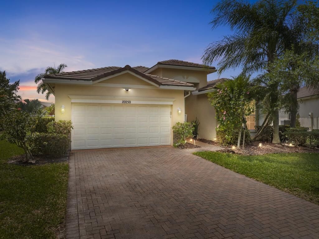 Photo of 10050 SW Cardigan Circle, Port Saint Lucie, FL 34987 (MLS # R11083124)