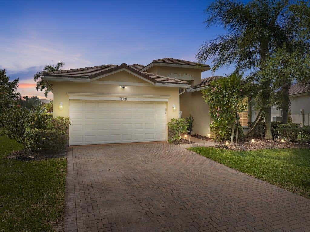 Photo of 10050 SW Cardigan Circle, Port Saint Lucie, FL 34987 (MLS # R11083124)