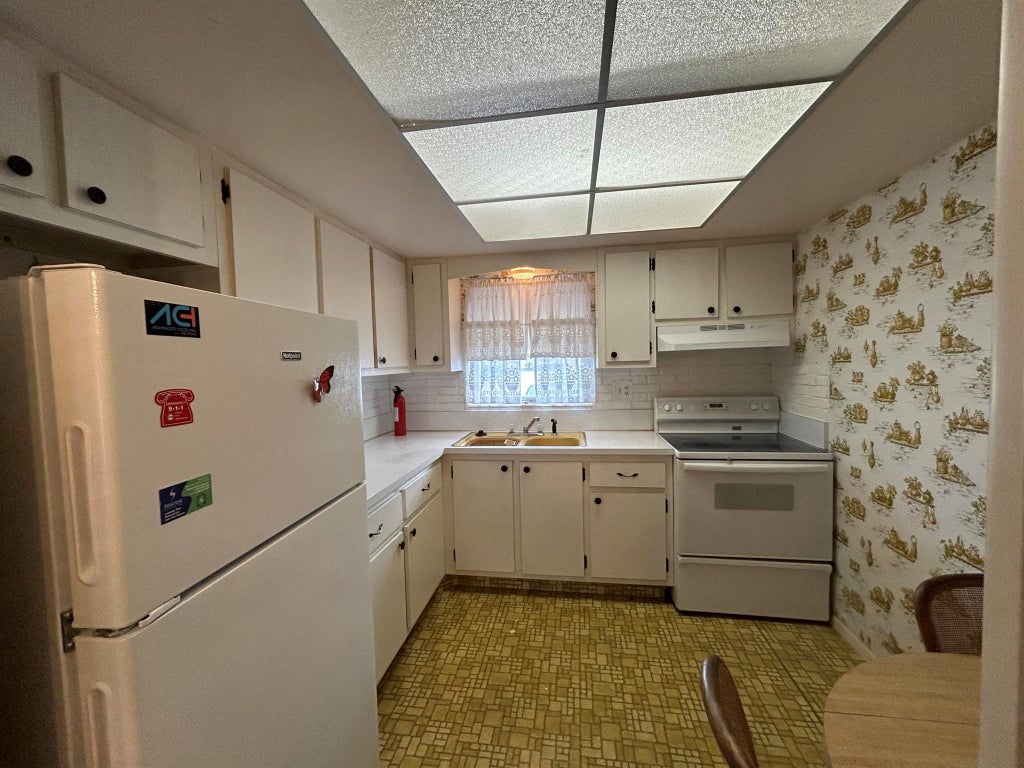 Photo of 2591 Barkley Drive W #D, West Palm Beach, FL 33415 (MLS # R10954171)