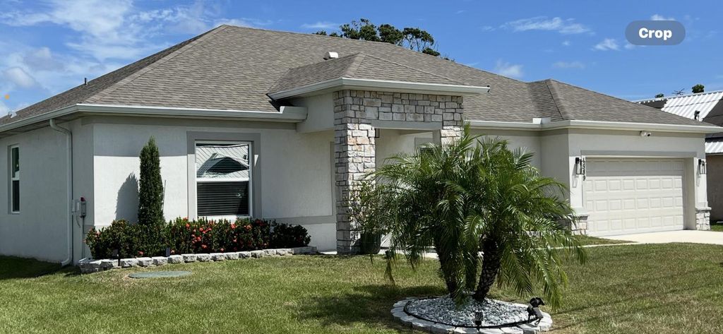 Photo of 1589 SE Dome Circle, Port Saint Lucie, FL 34952 (MLS # R11112417)