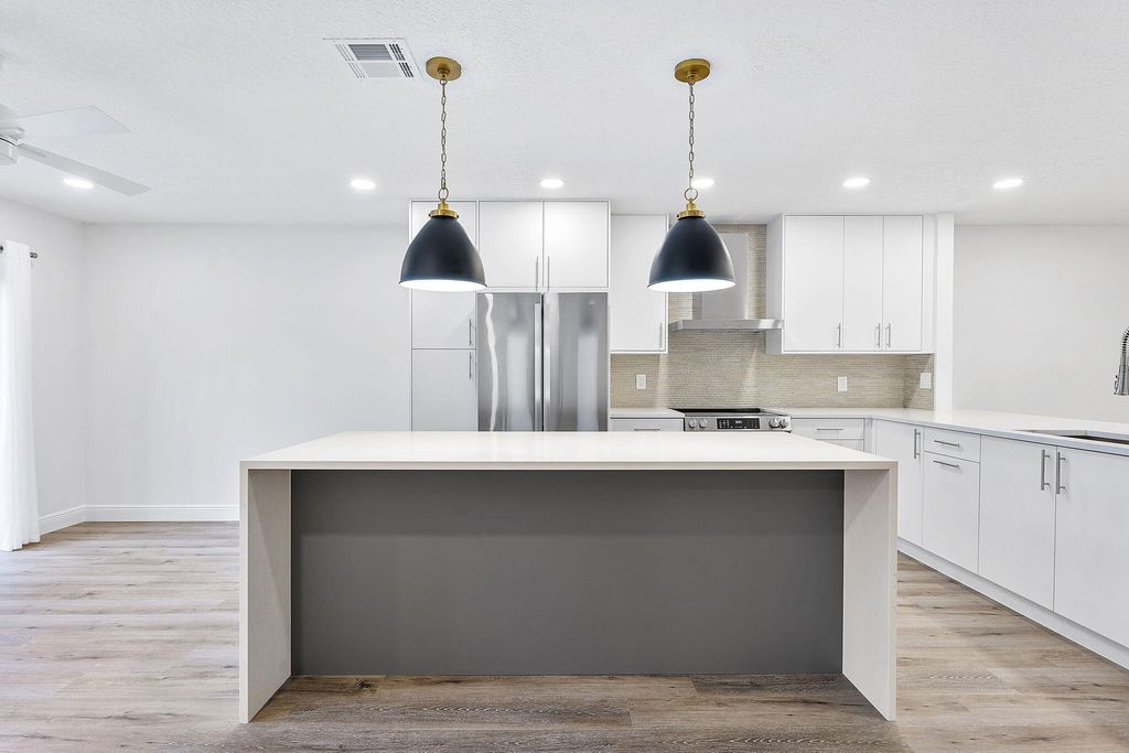 Photo of 9180 Pine Springs Drive, Boca Raton, FL 33428 (MLS # R11066193)