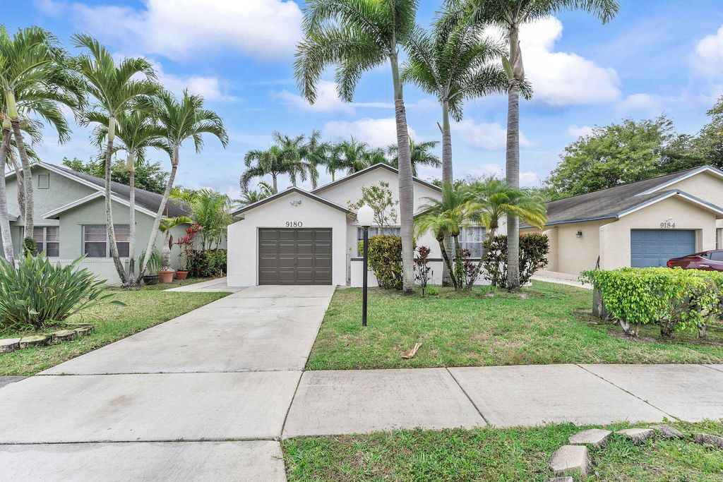 Photo of 9180 Pine Springs Drive, Boca Raton, FL 33428 (MLS # R11066193)