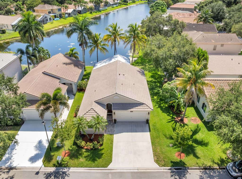 Photo of 4912 NW 55TH Boulevard, Coconut Creek, FL 33073 (MLS # B26063427)