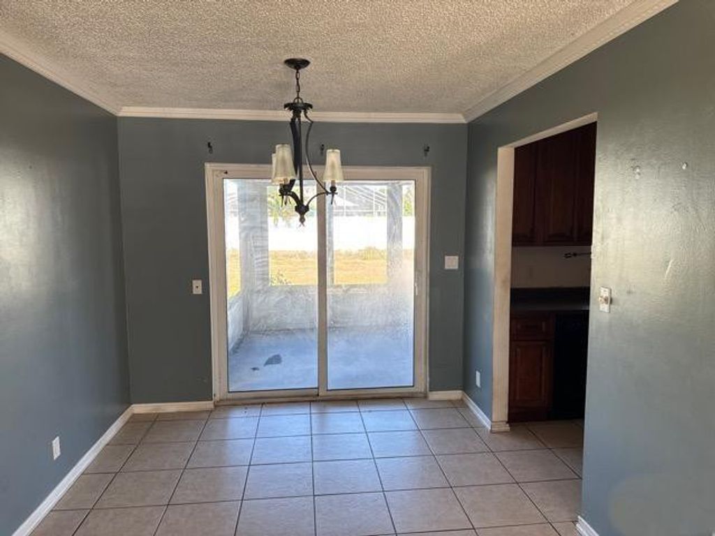 Photo of 321 NE Genesee Avenue, Port Saint Lucie, FL 34983 (MLS # F10548841)