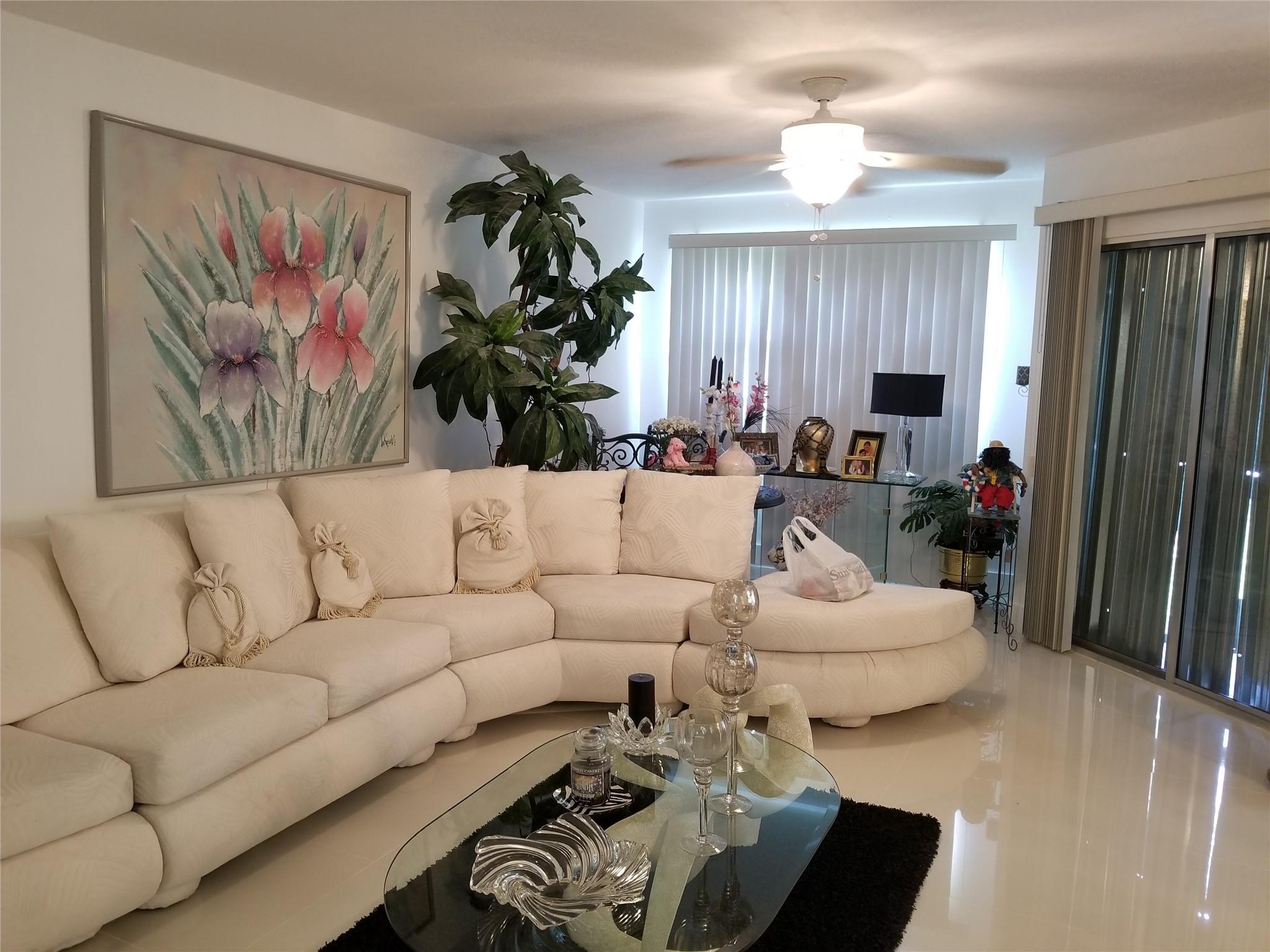 EXQUISITELY RENOVATED 1/1/1 FIRST FLOOR CONDO WITH SPECTULAR WIDE LAKE VIEW. WHITE PORCELAIN FLOORS,LAMINATE BEDROOM FLOOR. GRAND MIRRORED FOYER ENTRANCE. NEWER SECTION OF CENTURY VILLAGE. WASHER/DRYER IN UNIT. RELAX AND UNWIND ON YOUR PATIO WHILE ENJOYING THE VIEW OF THE LAKE. BEAUTIFULLY UPDATED CLUBHOUSEWITH EVERY AMENITY YOU CAN IMAGINE. POOL,THEATER,FITNESS CENTER,RESTAURANT,COURTESY BUS. TOO MANY TO LIST. STROLL TO PEMBROKE GARRDENS MALL AND ENJOY THE MANY RESTAURANTS AND SHOPS. IF YOU ENJOY KEEPING BUSY OR OCCASIONAL ACTIVITY,THERE IS A CALENDAR OF EVENTS. EXCELLENT LOCATION,HIGHWAY ACCESS IS MINUTES AWAY. HURRY BEFORE THIS BEAUTY IS GONE!