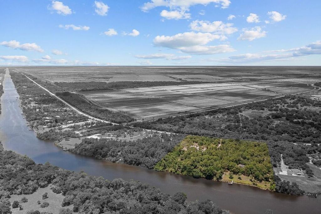 Photo of 11511 SW Citrus Boulevard, Palm City, FL 34990 (MLS # R10994957)