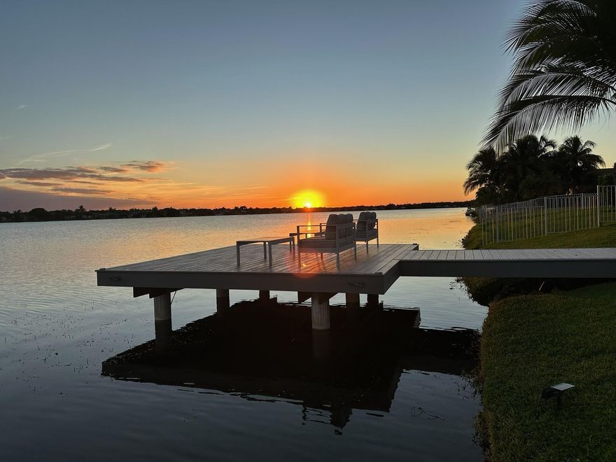 Modern, fully upgraded lakefront smart home in a private Pembroke Pines community. This stunning 3/2 features porcelain tile throughout, impact windows/doors, custom closets, elegant bathrooms, and a luxury kitchen with solid wood cabinetry, premium counters, stainless appliances, and a wine cooler. The finished double garage adds flexible living with A/C, LED lighting, and matching tile. Enjoy seamless smart control of lighting, climate, irrigation, water filtration, and security. Step outside to a resort-style backyard with a maintenance-free dock, solar lighting, built-in speakers, a sleek covered patio, and a modern pergola — all overlooking peaceful lake views. Move-in ready perfection!