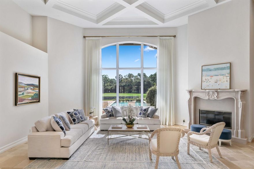 Perfectly situated on over 2/3 of an acre, this cul-de-sac residence offers some of the best views in Old Marsh. Enjoy SE and extensive views of the water, nature preserve, and the signature 8th hole of the Pete Dye championship course. The custom home features high ceilings, impact glass, a renovated open kitchen, updated pool and lanai, and a flexible layout with both a great room and family room, plus formal dining, breakfast nook, butler's pantry, wet bar, and a richly detailed study. The primary suite includes dual bathrooms, two walk-in closets, and a private sitting area overlooking the grounds. Additional highlights include a newer roof (2019), powder and cabana baths, and generous indoor-outdoor living for everyday comfort and effortless entertaining. Set within the​​‌​​​​‌​‌​​​‌‌​​​‌‌‌​​‌​​‌‌​​​​ private,