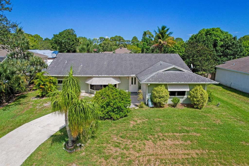 Photo of 2317 SW Indigo Lane Ln, Port Saint Lucie, FL 34953 (MLS # R10829383)