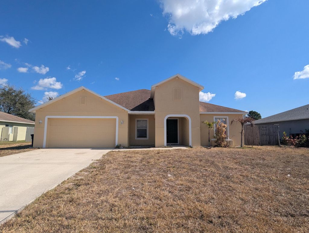 Photo of 2031 SW Hampshire Lane, Port Saint Lucie, FL 34953 (MLS # R11165578)