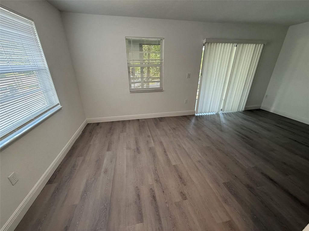 Photo of 4990 E Sabal Palm Blvd #202, Tamarac, FL 33319 (MLS # F10519431)