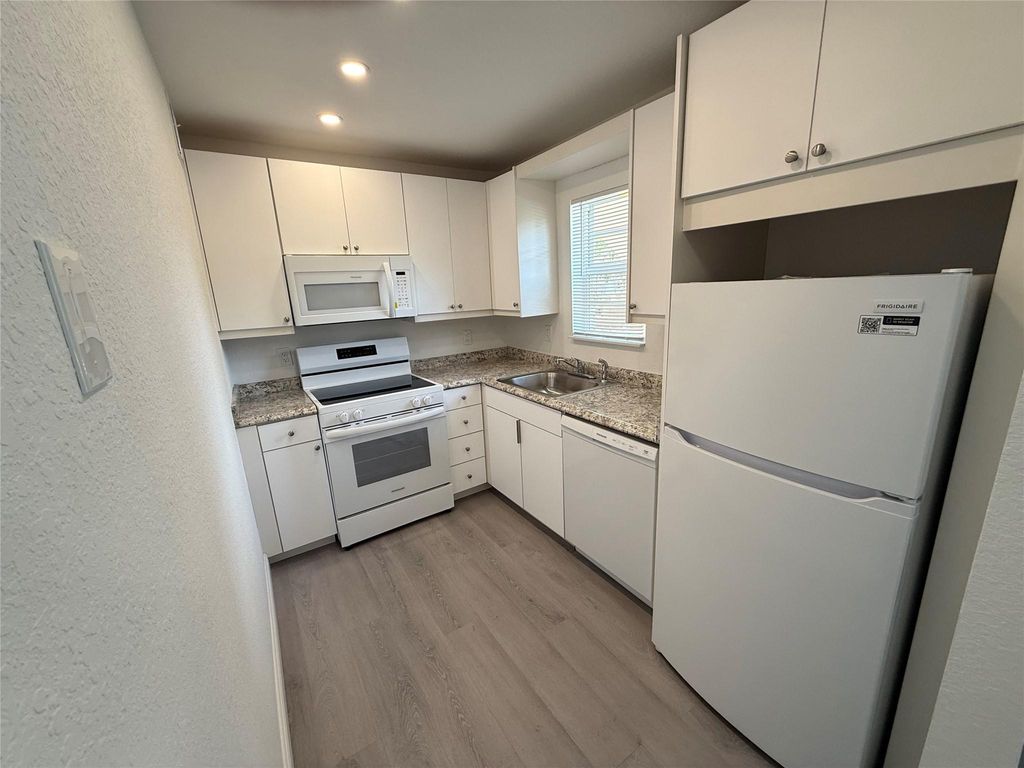 Photo of 4990 E Sabal Palm Blvd #202, Tamarac, FL 33319 (MLS # F10519431)