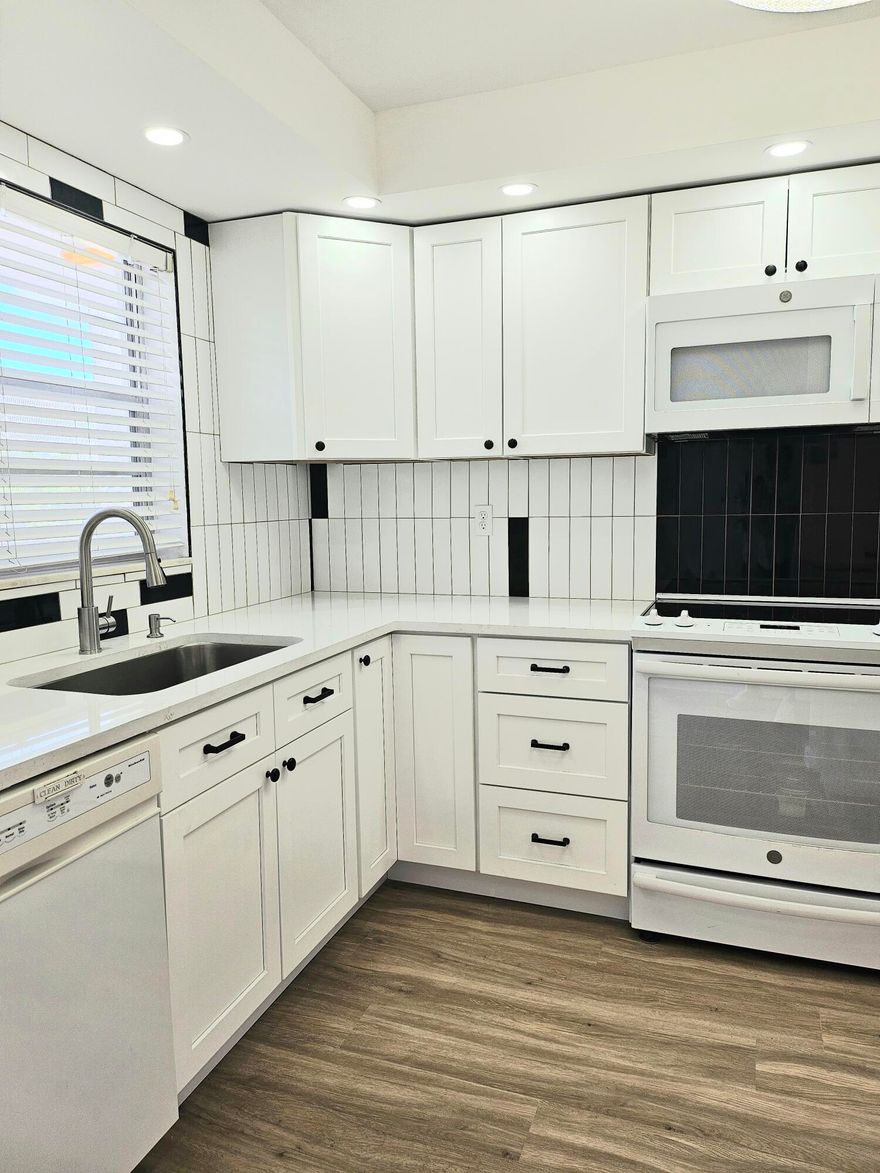 Welcome to this beautifully renovated 2-bedroom, 2-bathroom condo located in a sought-after 55+ golf course community. This light-filled home features a modern kitchen with updated cabinetry, sleek countertops, and appliances, opening to a spacious living and dining area perfect for entertaining. The primary suite offers a private bath and ample closet space, while the second bedroom is ideal for guests or a home office. The community provides a low-maintenance lifestyle with an HOA, 700 credit score required. No minimum income requirement or minimum downpayment. Reasonable maintenance fees include WATER, PEST CONTROL, CABLE TV, INTERNET, INS & RESERVE FUND! Leaving you more time to enjoy life. HOA IS FULLY FUNDED AND NO ASSESSMENTS