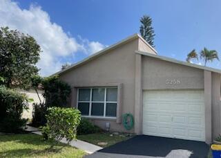 Ready, set, RENT this charming 2BR, 2BA home with garage in peaceful HOPA (ages 55+) community, Boynton Beach! All freshly painted interior, NEWLY remodeled kitchen and baths! Flooded with natural light, with Florida room and a private open patio. Updated lighting and fans, tile floors throughout. Landlord will consider your pets too! Picturesque community is just 238 homes built around two lakes, with waterfront strolling promenades, lake front pool and clubhouse, tennis/pickleball courts, and more. Convenient to shopping, dining, highways, 3 Int'l airports, and just 7 miles west of the Atlantic Ocean beaches!