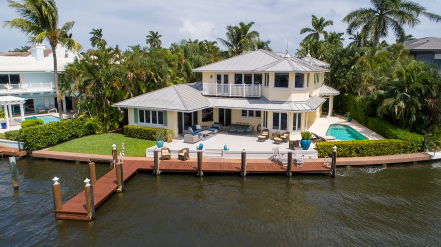 Completely renovated in 2001. Close to the beach in the desirable Seagate neighborhood, this direct Intracoastal estate fronts a wide yacht basin protected in a no-wake zone.Fronting 100± feet on the wide yacht basin, this fabulous point-like estate captures dramatic Intracoastal views seeming from the prow of a yacht.  Relaxed waterfront living and entertaining are at home in the Key West-style residence. Expansive outdoor living spaces wrap around the residence and feature a waterside lounge deck and pool patio.  The information herein is deemed reliable and subject to errors, omissions or changes without notice.  The information has been derived from architectural plans or county records. Buyer should verify all measurements.