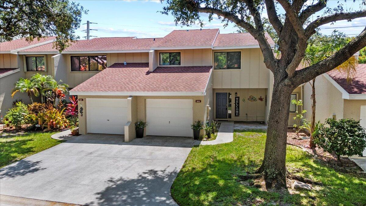 Welcome to this beautifully updated townhome offering nearly 1,500 sq ft of comfortable living space. Featuring 3 bedrooms and 2.5 bathrooms, this home blends functionality with modern design. The kitchen is a standout with stainless steel appliances, granite countertops, a decorative backsplash, breakfast bar, and a dedicated coffee bar. The open dining area showcases a charming shiplap accent wall, while the tiled first floor offers easy maintenance and flow. Enjoy added convenience with an inside laundry room, pantry for storage, a welcoming foyer entry and screen lanai. Ideally located close to top-rated schools, shopping, restaurants, and all the essentials--this home is a perfect blend of style, comfort, and location.
