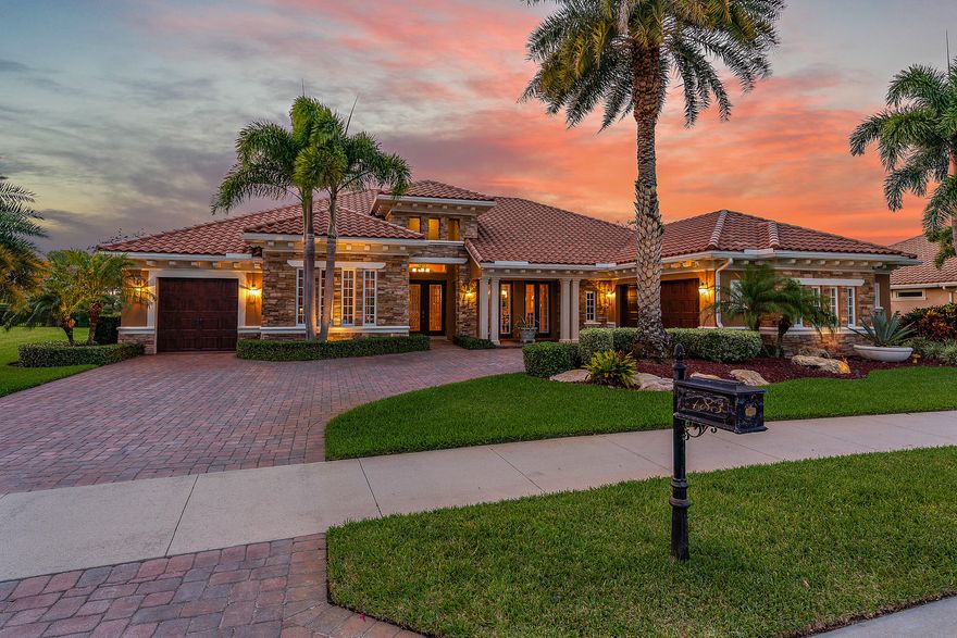 Come see why this home was the Winner in the Parade of Homes in Martin County! You WILL NOT find a MORE CUSTOM home for the money in the all of Martin County! This place is maintained as if it was built YESTERDAY! SO many features to list for this 4 Bed, 4.5 Bath 3 Car Garage, nearly 3800 Living SQ Ft and over 5600 Sq ft of PERFECTION! This completely custom home has every upgrade imaginable starting with the exterior Pool/Spa entertaining area complete with an amazing Summer Kitchen, Tiki Hut, Pergola, Fire Pit, Extensive Patio Pavers for hosting a large pool party that feels like your at your very own resort! All of this backs up to a lake for supreme rear privacy and totally surrounded with the MOST TROPICAL LANDSCAPING you will ever see! The interior is JUST AND UPGRADED with 24x24 Tra vertine tile and a Chefs kitchen to Die For with gas range Custom Cabinets and so much more. The entire house has Surround sound throughout th home inside or out! FULL HOUSE GENERATOR AND NATURAL GAS!