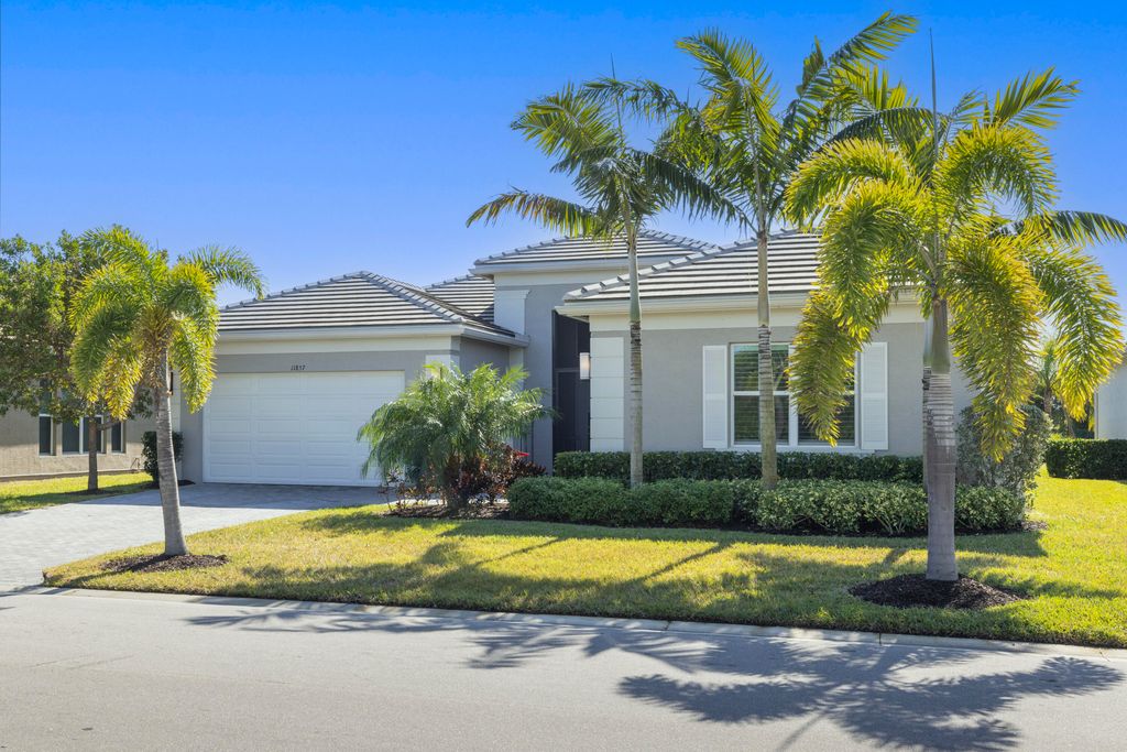 Photo of 11857 SW Sailfish Isles Way, Port Saint Lucie, FL 34987 (MLS # R11053249)