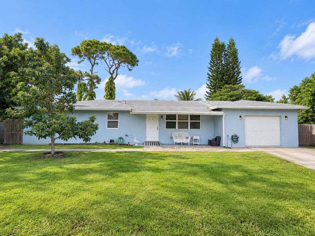 Photo of 2531 Sun Up Lane, Lake Worth, FL 33462 (MLS # B26079790)