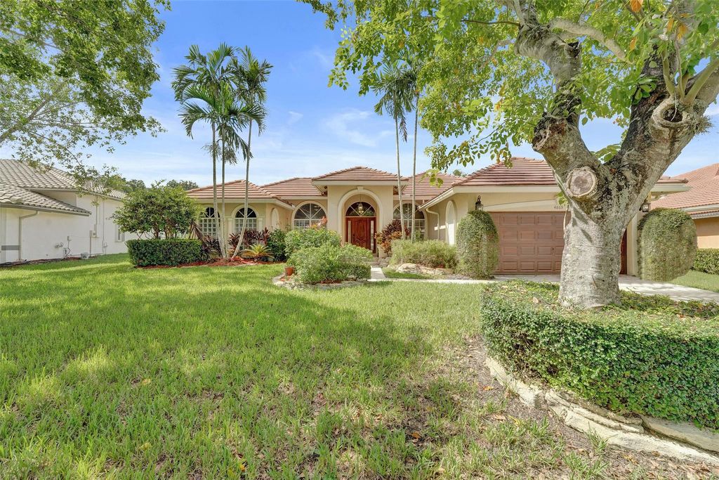Photo of 4869 Kensington Circle, Coral Springs, FL 33076 (MLS # F10527505)