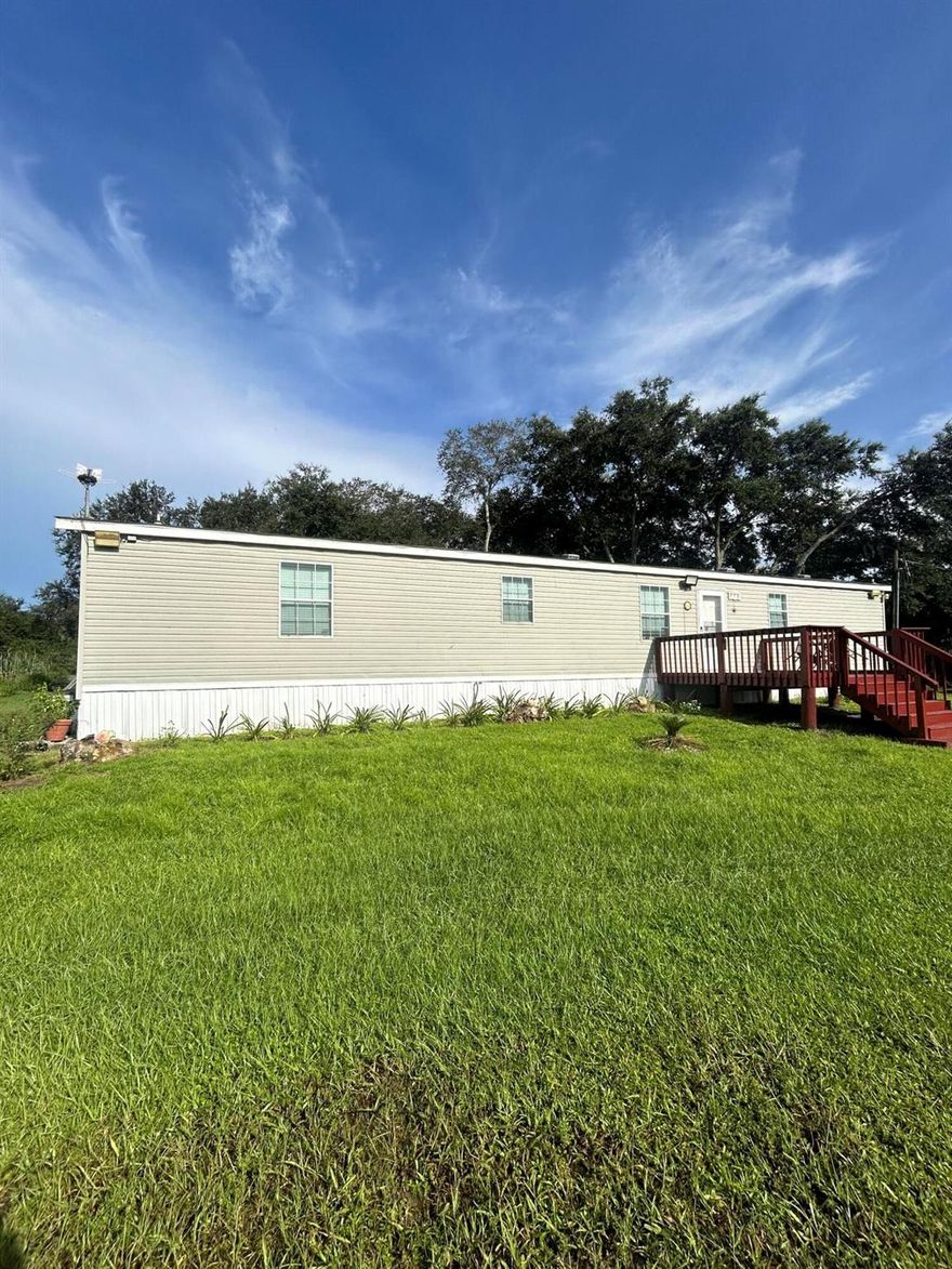 Beautiful ranch style living where breath of fresh air surrounds the 1.25 acres where the home sits. Great place to have your hobby farm with great farm style amenities.  Community pool available to the residents of Montura Ranches.