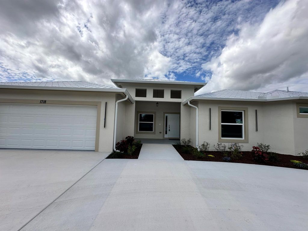 Photo of 2596 SW Edgarce Street, Port Saint Lucie, FL 34953 (MLS # R11095060)