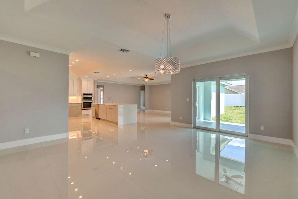 Photo of 2596 SW Edgarce Street, Port Saint Lucie, FL 34953 (MLS # R11095060)