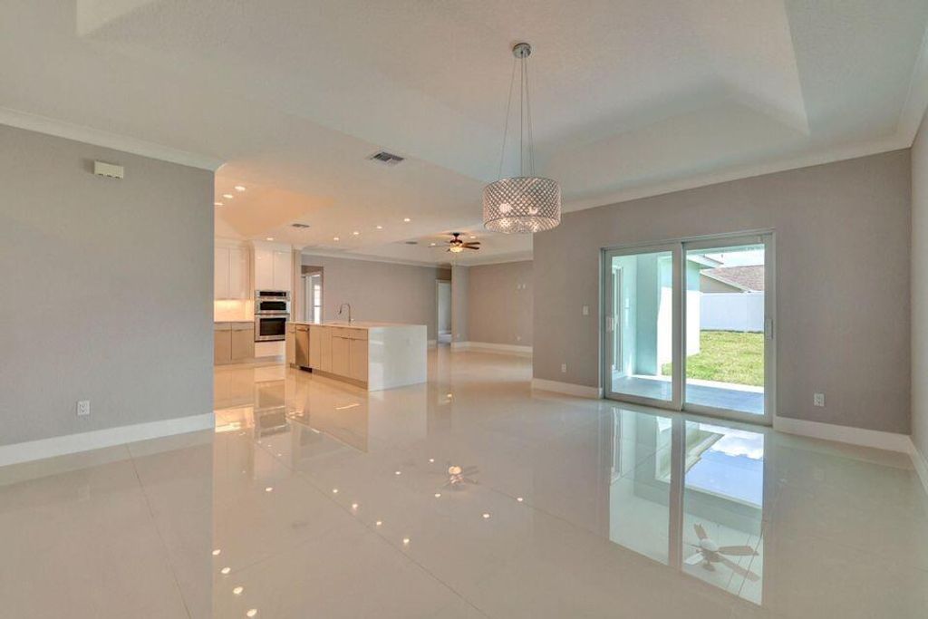 Photo of 2596 SW Edgarce Street, Port Saint Lucie, FL 34953 (MLS # R11095060)