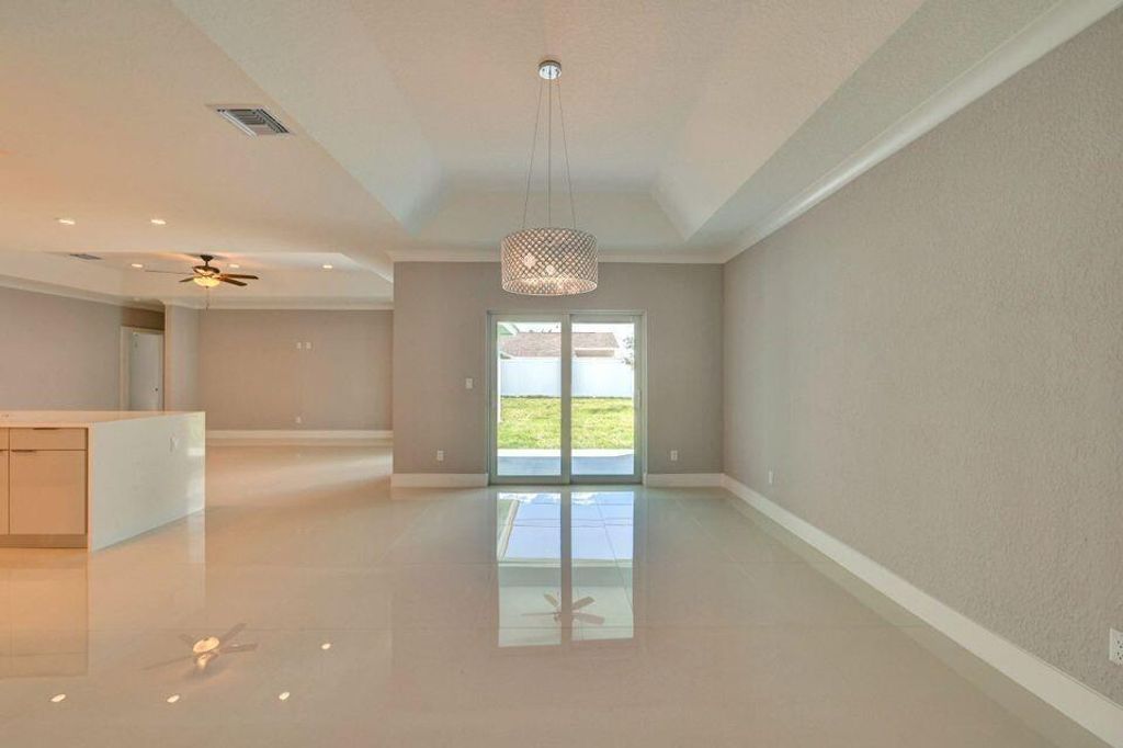 Photo of 2596 SW Edgarce Street, Port Saint Lucie, FL 34953 (MLS # R11095060)