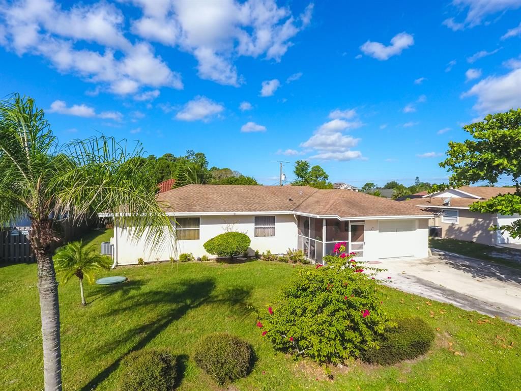 Photo of 202 NW Curtis Street, Port Saint Lucie, FL 34983 (MLS # R10756195)