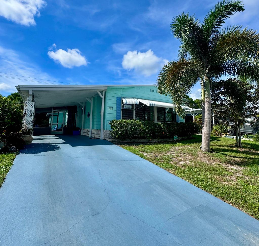 Photo of 33 Vista De Laguna, Fort Pierce, FL 34951 (MLS # R11096028)