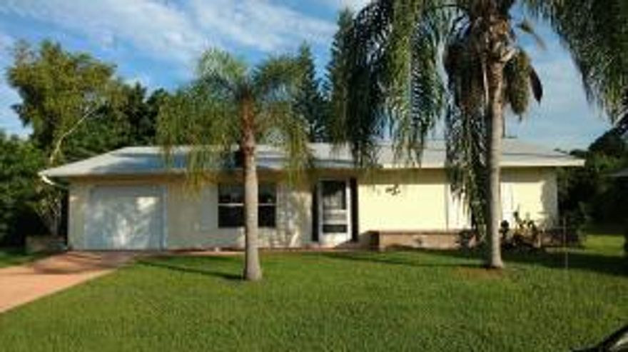 MULTIPLE OFFERS - Highest and Best due by 9/28 @ noon **Handyman Special** Property is sold AS-IS and needs TLC. 3 bedroom, 2 bath POOL home with attached 1-car garage. Split bedroom layout; kitchen with pass thru to family room. Screened patio and a large screen enclosure over the pool. Newer roof in 2015. Tile and wood laminate flooring throughout.