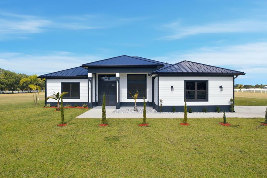 A new construction home! And ready to move in, enjoy a peaceful 5 acres of equine property. Close to St.Lucie County Fair Grounds. Ten minutes away from I-95 and Turnpike. Not only is it a beautiful property, it is also in a wonderful location in close proximity of many upcoming developments near Midway Road. All the while maintaining distance from the city noise. Part of a Neighborhood association with trails for walking, or horse riding.