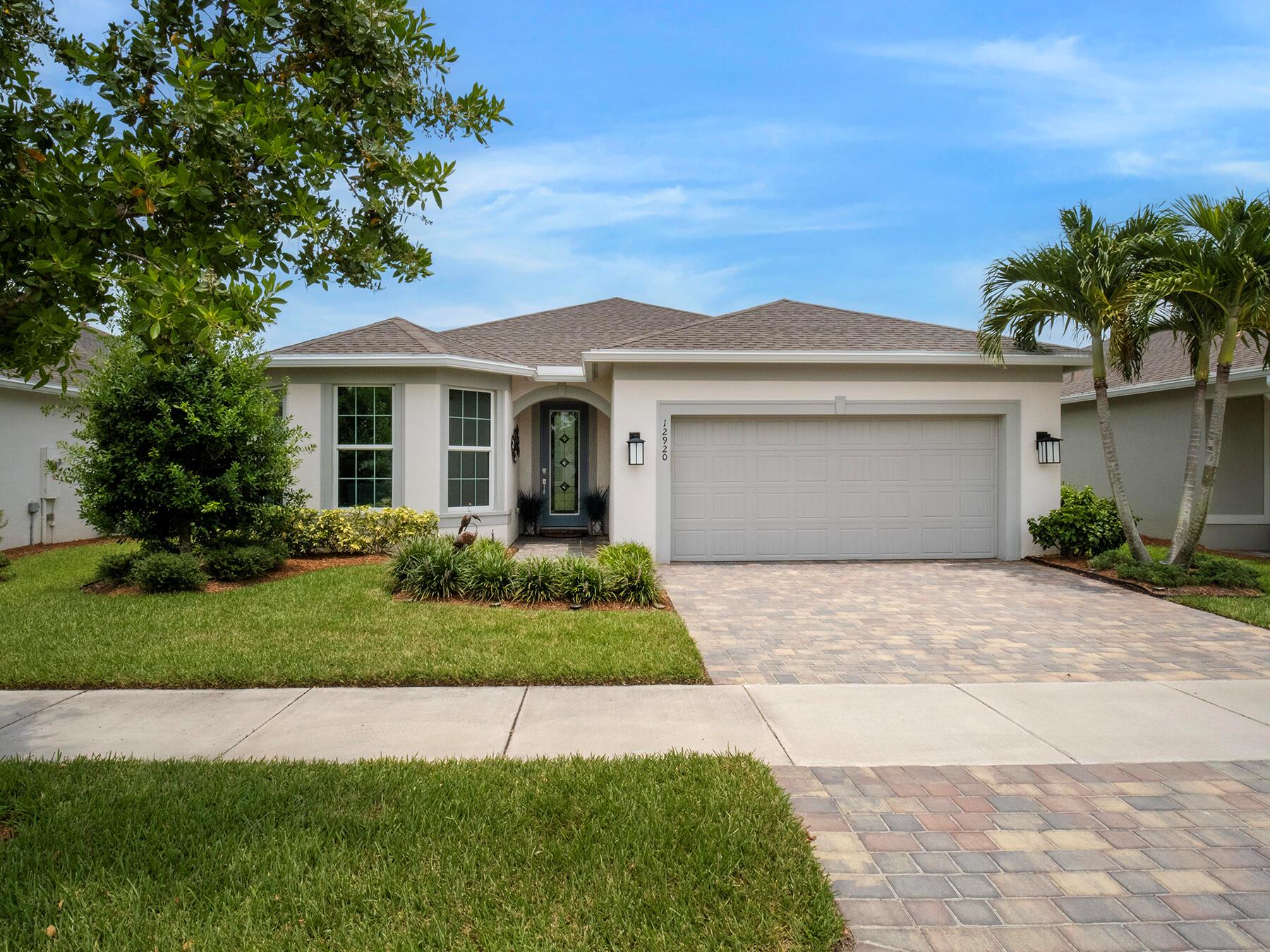 Welcome to this beautifully upgraded 3-bedroom, 2-bathroom home with a den, located in the highly desirable 55+ community of Del Webb. Every inch of this home has been thoughtfully transformed with top tier upgrades offering both luxury and comfort from the moment you walk in.The open-concept floor plan showcases a chef's kitchen featuring quartz countertops, top-of-the-line appliances, a gas range, and stylish finishes throughout. Custom touches like shiplap accent walls, designer lighting, built-in closets, and motorized shades on the sliding doors truly set this home apart. Energy-efficient solar panels help keep utility costs low.Step outside to your own private retreat--an inviting heated saltwater pool and spa surrounded by a panoramic screened lanai with serene lake views.