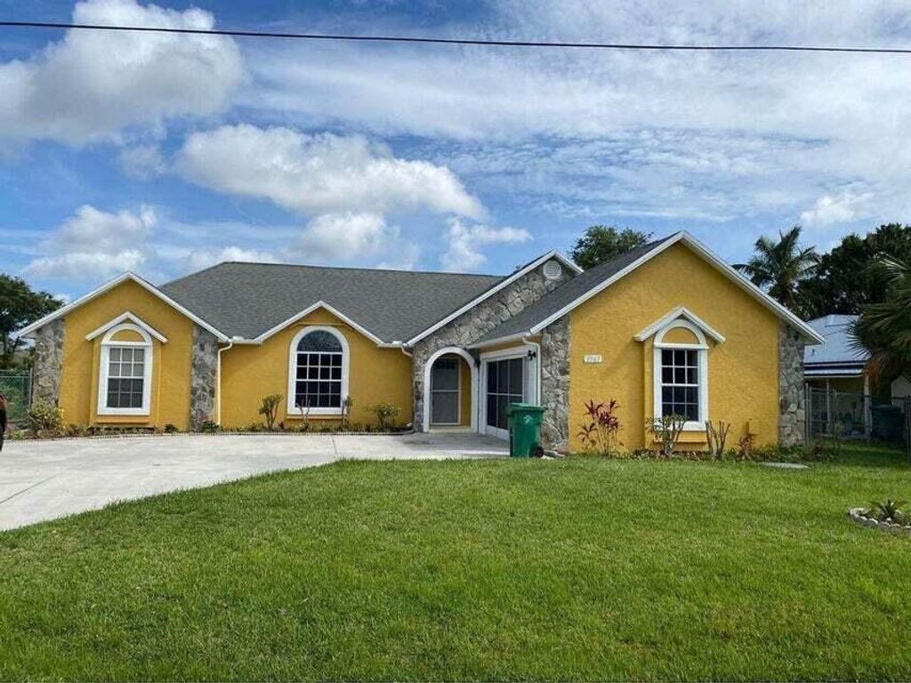 Photo of 2767 SE Rawlings Road, Port St Lucie, FL 34952 (MLS # R10894336)